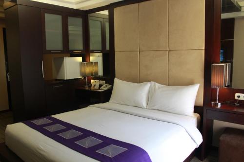 Imagen de la habitación del Hotel Metro, Cikarang. Foto 10