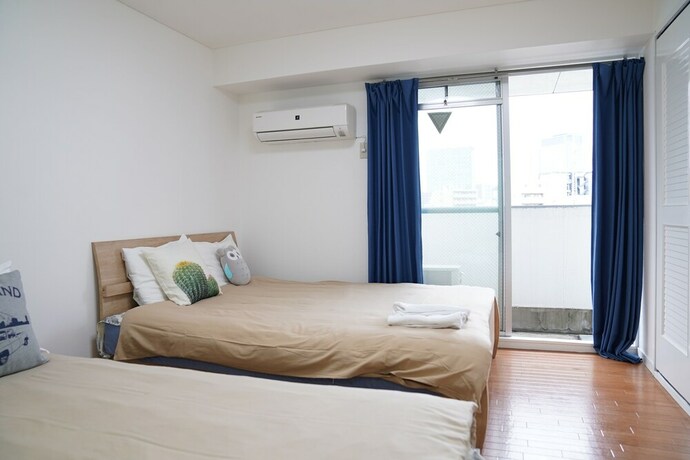 Imagen de la habitación del Hotel Metro Daikoku Apartment. Foto 19
