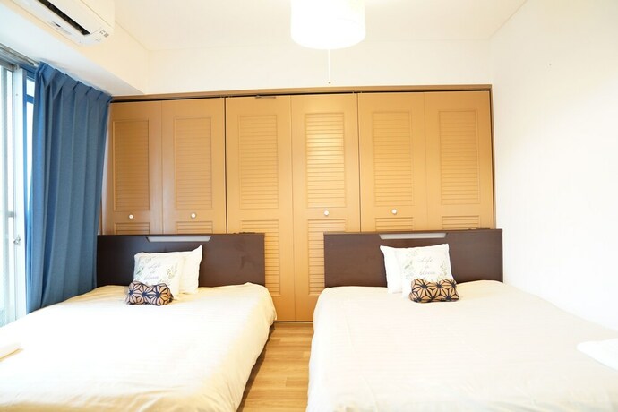Imagen de la habitación del Hotel Metro Daikoku Apartment. Foto 21