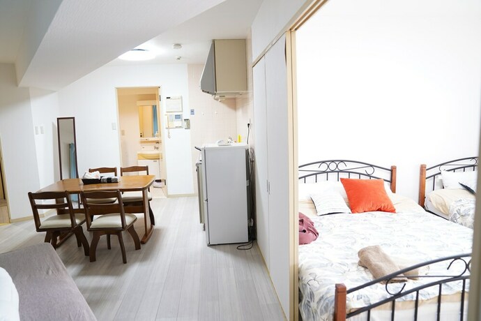 Imagen de la habitación del Hotel Metro Daikoku Apartment. Foto 28