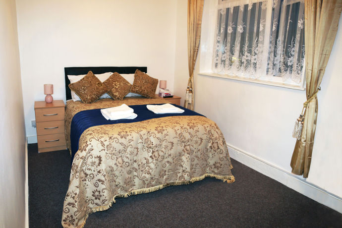 Imagen de la habitación del Hotel Metro House. Foto 2