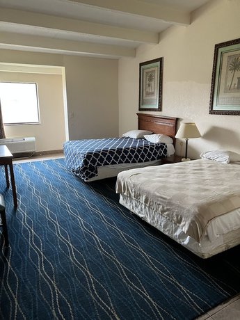 Imagen de la habitación del Hotel Metro Inn and Suites. Foto 9