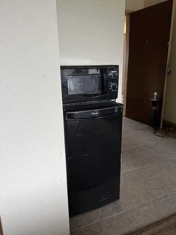 Imagen de la habitación del Hotel Metro Inn and Suites. Foto 11