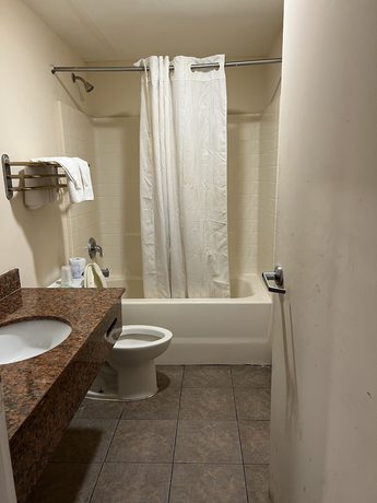 Imagen de la habitación del Hotel Metro Inn and Suites. Foto 13