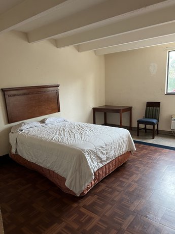 Imagen de la habitación del Hotel Metro Inn and Suites. Foto 14