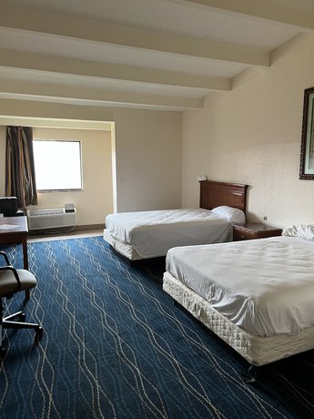 Imagen de la habitación del Hotel Metro Inn and Suites. Foto 15