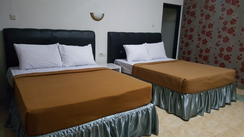 Imagen de la habitación del Hotel Metro Malioboro Living. Foto 13