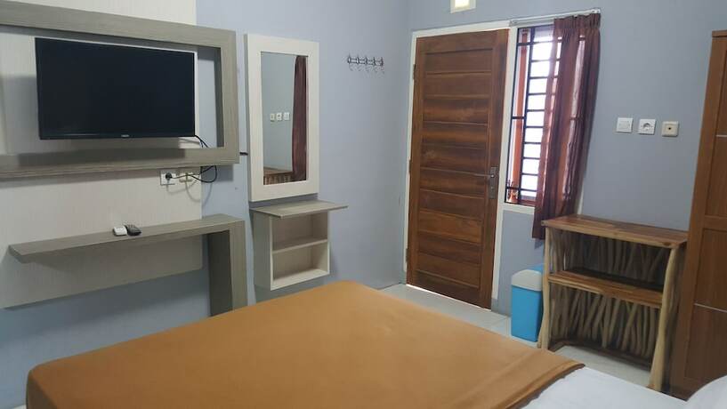 Imagen de la habitación del Hotel Metro Malioboro Living. Foto 16