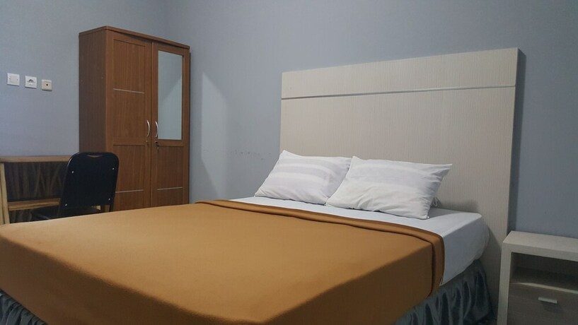 Imagen de la habitación del Hotel Metro Malioboro Living. Foto 19