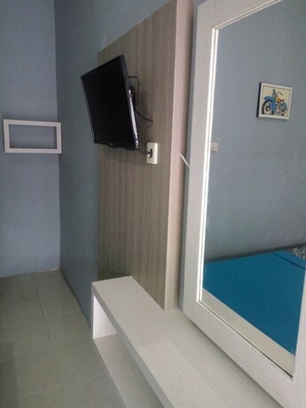 Imagen de la habitación del Hotel Metro Malioboro Living. Foto 21