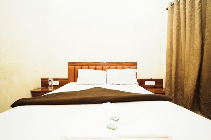 Imagen de la habitación del Hotel Metro Palace, Vasai-Virar. Foto 8