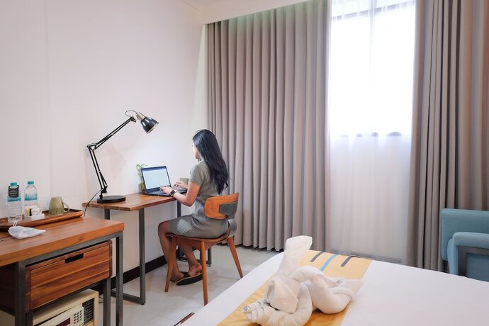 Imagen de la habitación del Hotel Metro Park View Hotel Kota Lama Semarang. Foto 13
