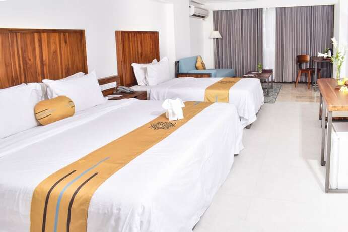 Imagen de la habitación del Hotel Metro Park View Hotel Kota Lama Semarang. Foto 20