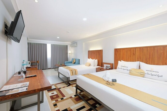 Imagen de la habitación del Hotel Metro Park View Hotel Kota Lama Semarang. Foto 23