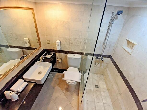 Imagen de la habitación del Hotel Metro Park View Hotel Kota Lama Semarang. Foto 26