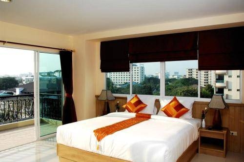 Imagen de la habitación del Hotel Metro Point Bangkok. Foto 3
