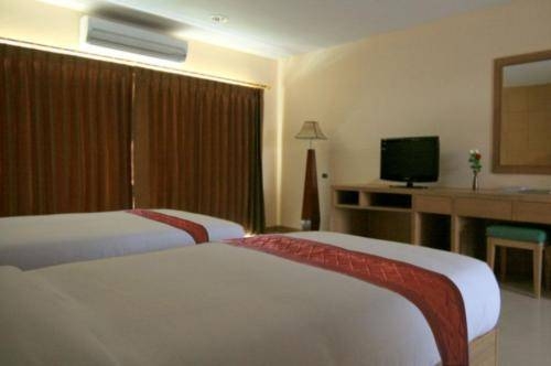 Imagen de la habitación del Hotel Metro Point Bangkok. Foto 4
