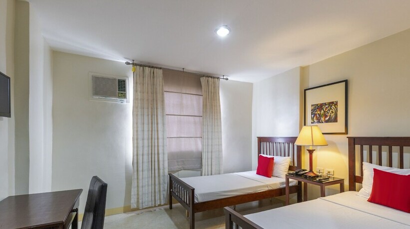 Imagen de la habitación del Hotel Metro Vigan Inn. Foto 5