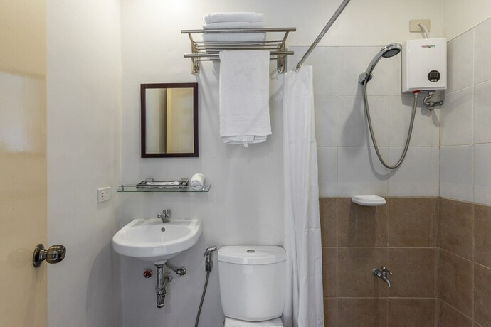 Imagen de la habitación del Hotel Metro Vigan Inn. Foto 11