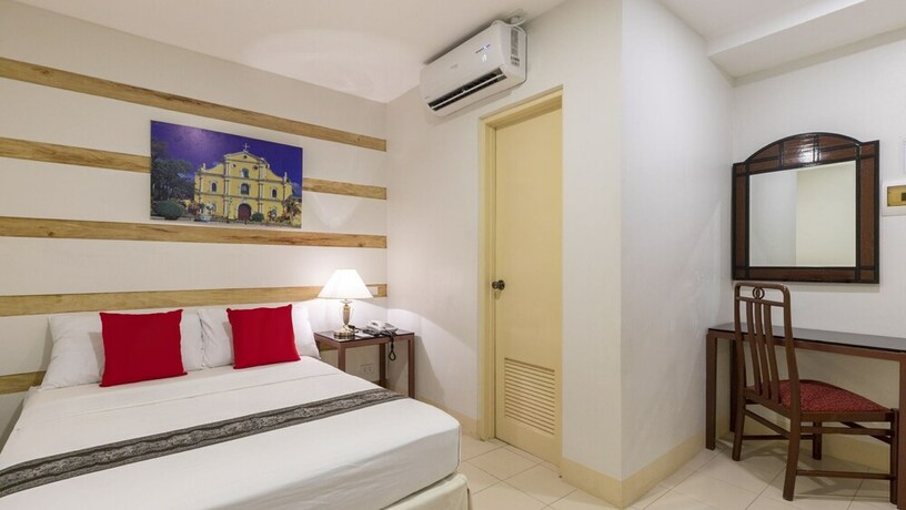 Imagen de la habitación del Hotel Metro Vigan Inn. Foto 12