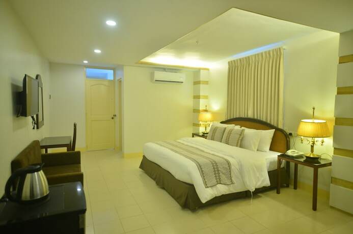 Imagen de la habitación del Hotel Metro Vigan Inn. Foto 11