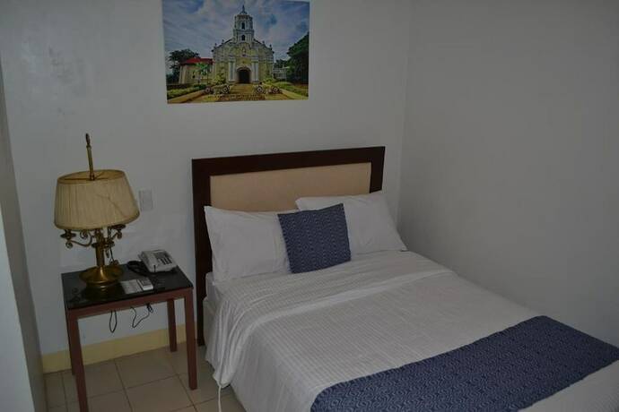 Imagen de la habitación del Hotel Metro Vigan Inn. Foto 12