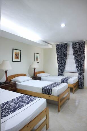 Imagen de la habitación del Hotel Metro Vigan Inn. Foto 15