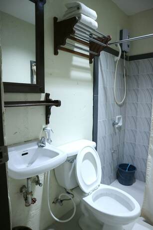 Imagen de la habitación del Hotel Metro Vigan Inn. Foto 17