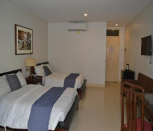 Imagen de la habitación del Hotel Metro Vigan Inn. Foto 20