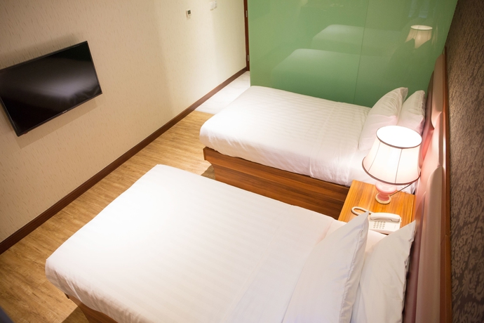 Imagen de la habitación del Hotel Metro Winner, Kowloon. Foto 12