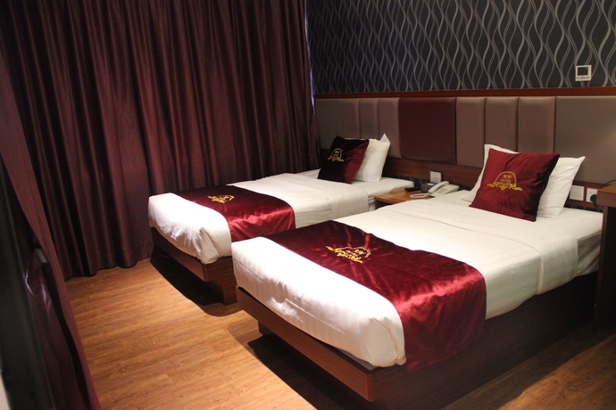 Imagen de la habitación del Hotel Metro Winner, Kowloon. Foto 16