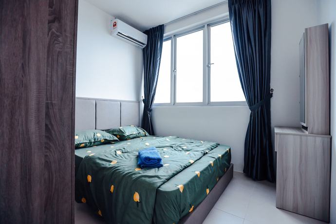 Imagen de la habitación del Hotel MetroCity Staycation. Foto 2