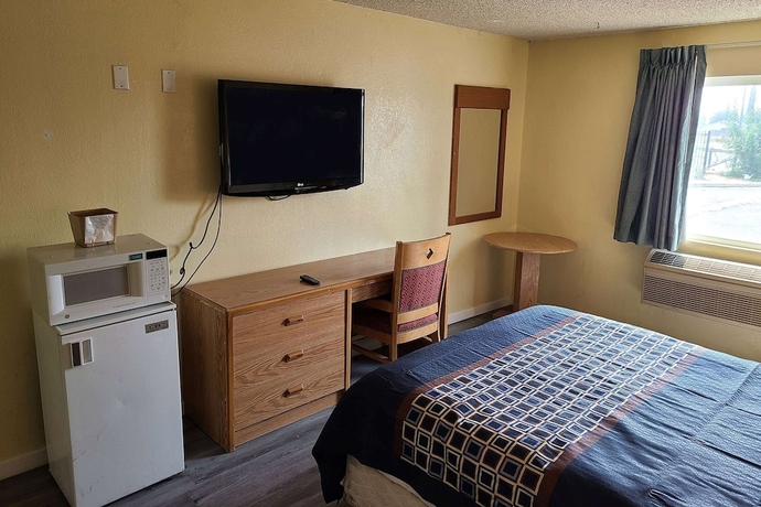 Imagen de la habitación del Hotel MetroParc 'nSuites. Foto 2