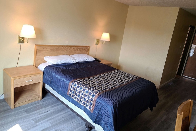 Imagen de la habitación del Hotel MetroParc 'nSuites. Foto 3