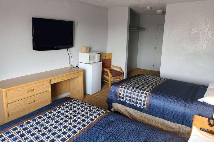 Imagen de la habitación del Hotel MetroParc 'nSuites. Foto 2