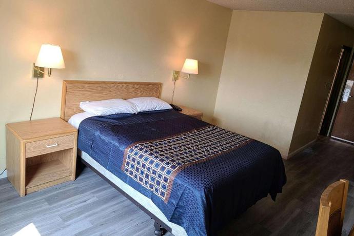 Imagen de la habitación del Hotel MetroParc 'nSuites. Foto 4