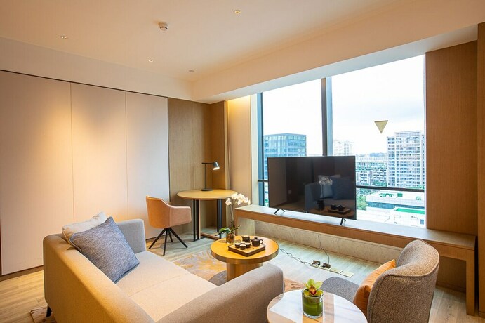 Imagen de la habitación del Hotel Metropark Hongqiao Shanghai. Foto 15