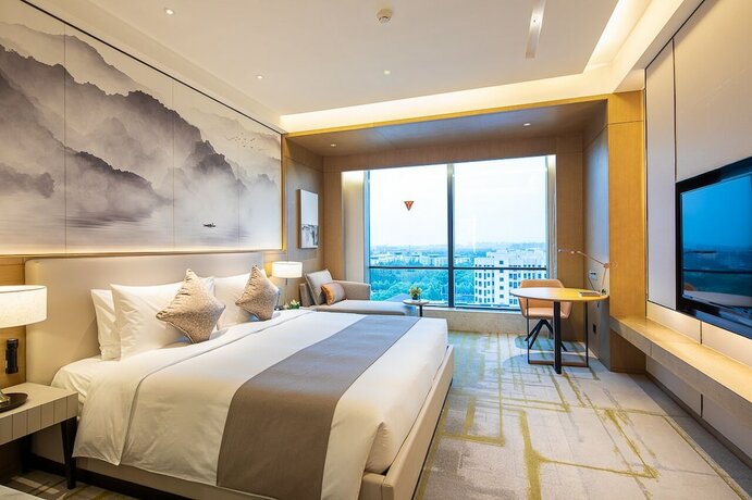 Imagen de la habitación del Hotel Metropark Hongqiao Shanghai. Foto 18