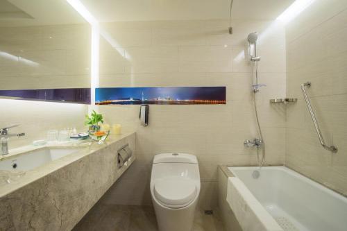 Imagen de la habitación del Hotel Metropark Macau. Foto 6