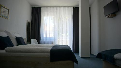 Imagen de la habitación del Hotel Metropol CB. Foto 7