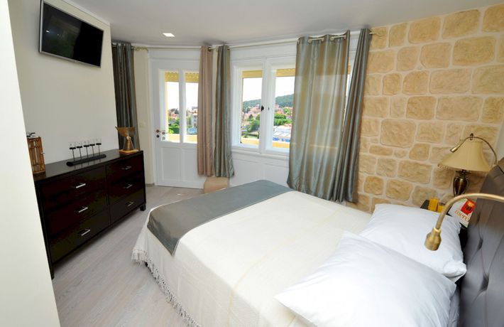 Imagen de la habitación del Hotel Metropole Luxury Rooms. Foto 2