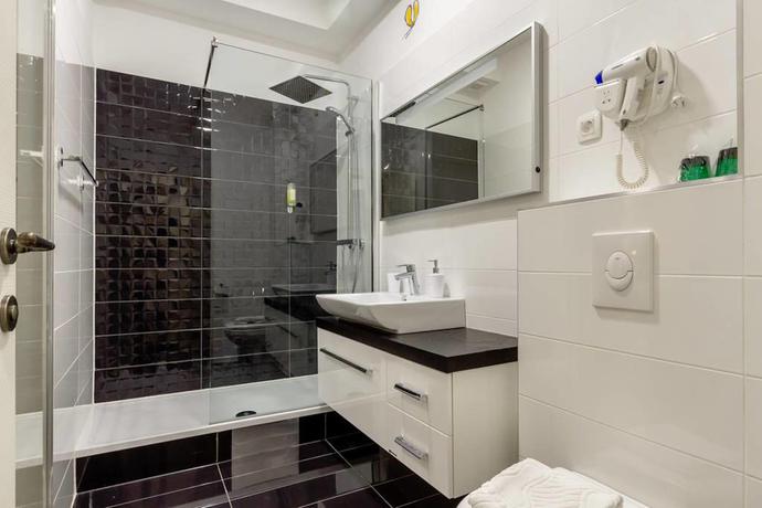 Imagen de la habitación del Hotel Metropole Luxury Rooms. Foto 8