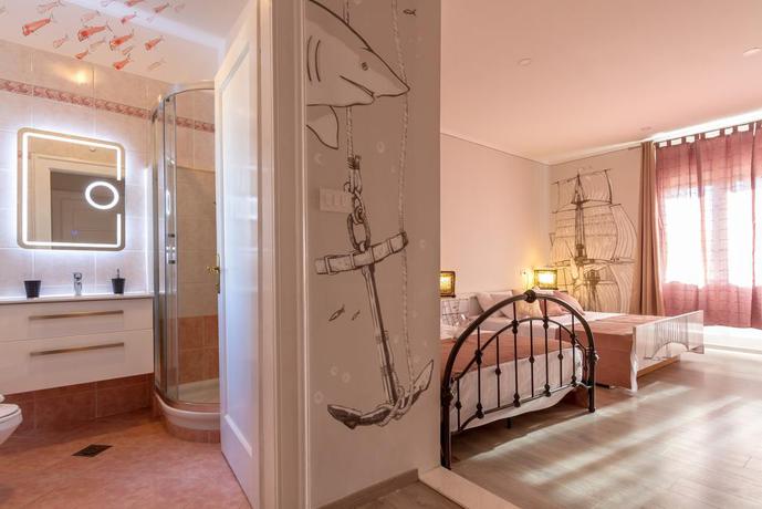 Imagen de la habitación del Hotel Metropole Luxury Rooms. Foto 11