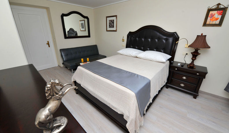 Imagen de la habitación del Hotel Metropole Luxury Rooms. Foto 16