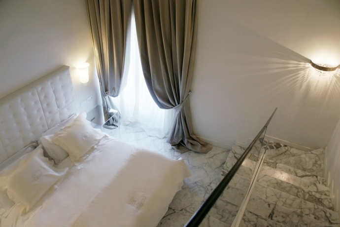 Imagen de la habitación del Hotel Metropole Maison D'hotes. Foto 10