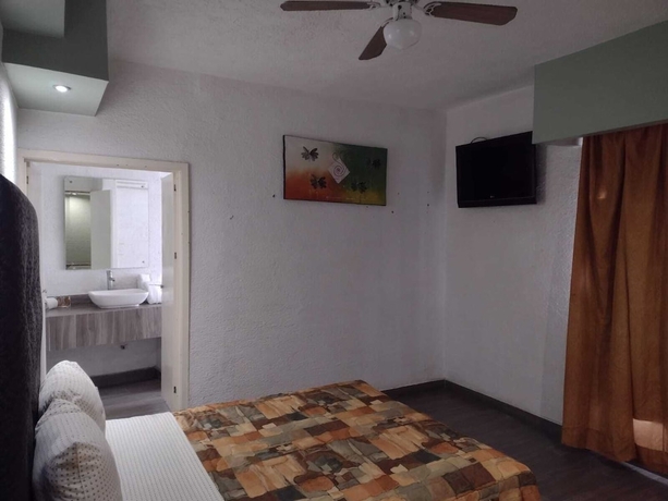 Imagen de la habitación del Hotel Metropolitan, Arcos Vallarta. Foto 4