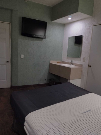 Imagen de la habitación del Hotel Metropolitan, Arcos Vallarta. Foto 6