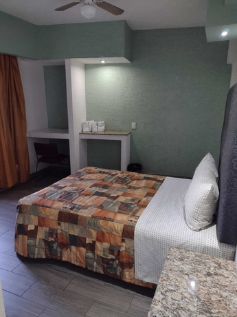 Imagen de la habitación del Hotel Metropolitan, Arcos Vallarta. Foto 7