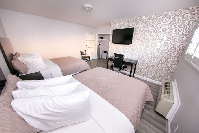 Imagen de la habitación del Hotel Metropolitan Inn and Suites. Foto 9