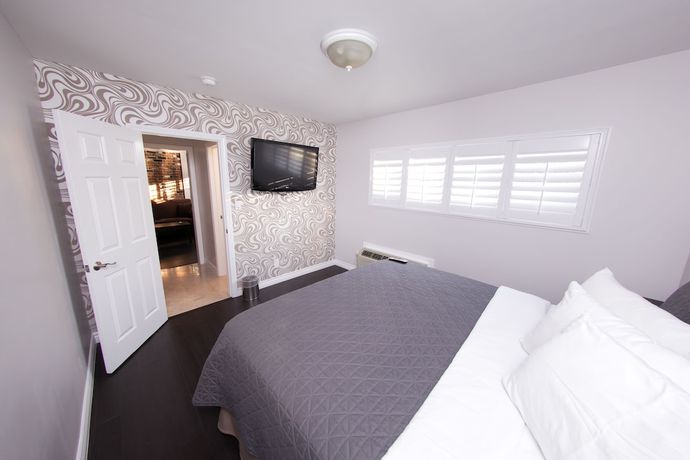 Imagen de la habitación del Hotel Metropolitan Inn and Suites. Foto 11